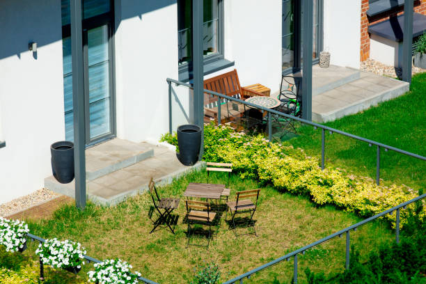 istock Balcony and lawn with flowers 967099212