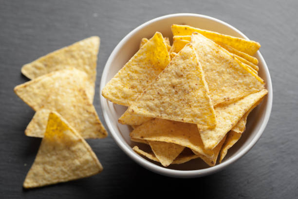 istock Nachos chips. Delicious salty tortilla snack 967100476