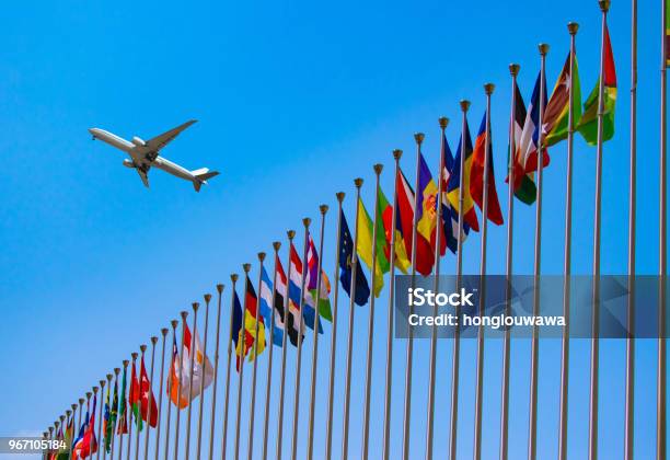 Flags And Airplane Stock Photo - Download Image Now - Country - Geographic Area, Global Communications, Flag