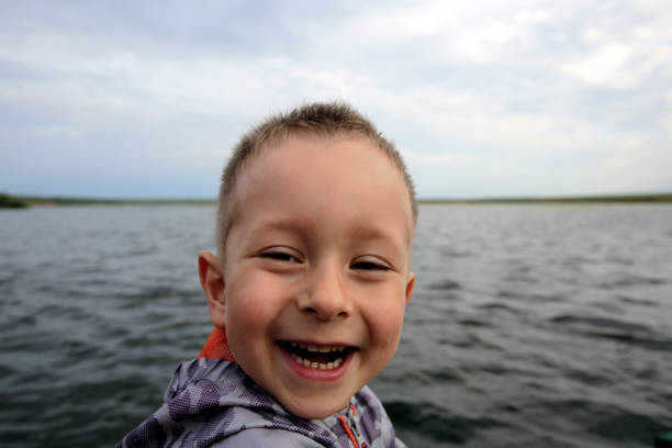 istock Cute smiling little boy outdoors 967109052