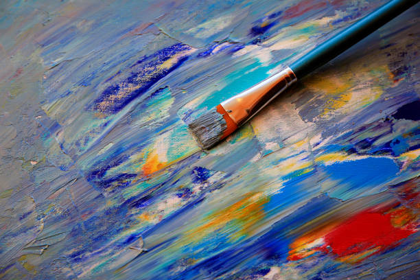 istock Closeup background of brush and palette. 967110332