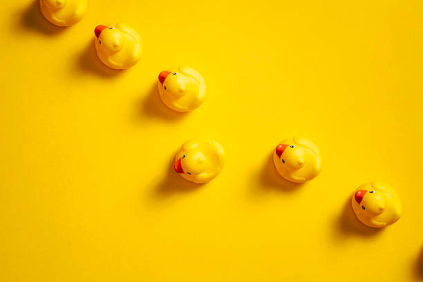 istock Your Way - Rubber ducks on yellow - Background Individuality Ideas 967110390