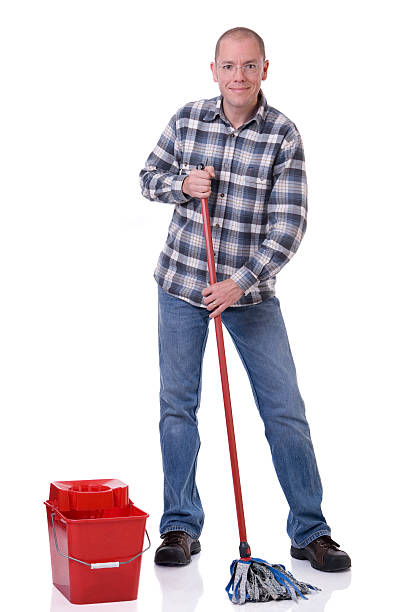 istock Man with bucket and mop 96711068