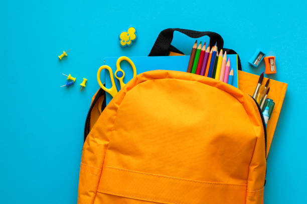 istock Back to school concept. Backpack with school supplies. Top view. Copy space 967112842