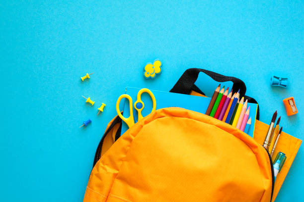 istock Back to school concept. Backpack with school supplies. Top view. Copy space 967112908
