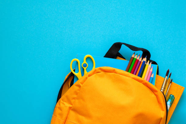 istock Back to school concept. Backpack with school supplies. Top view. Copy space 967112918