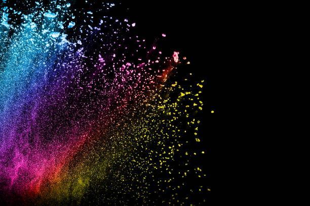 istock Multi color powder explosion isolated on black background. Colored dust splash cloud on black background. Launched colorful particles on background. Painted Holi. 967120032