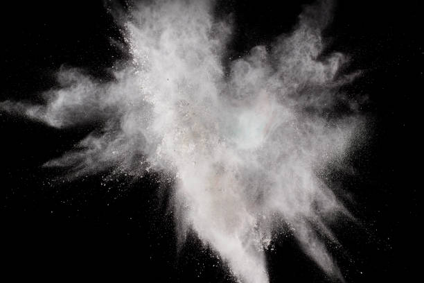 istock Launched white powder splash on black background. Bizarre forms of of white powder explosion cloud against dark background. 967120228