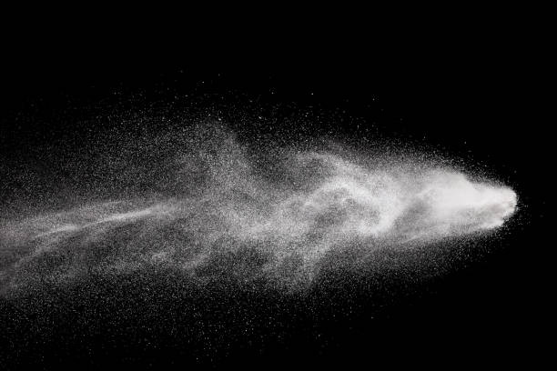 istock Launched white powder splash on black background. Bizarre forms of of white powder explosion cloud against dark background. 967120284