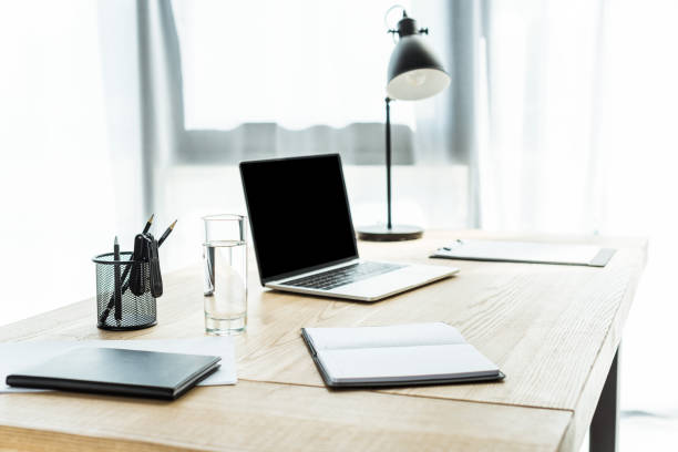 istock workplace with laptop and different supplies at modern office 967121052