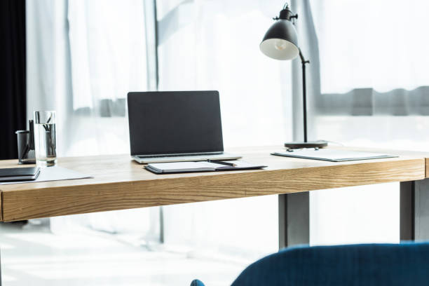 istock workplace with laptop and various supplies at modern office 967121504