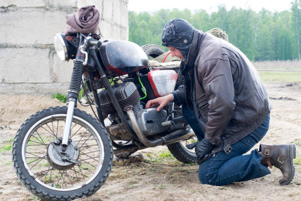 istock A post apocalyptic man on motorcycle near the destroyed building 967122200