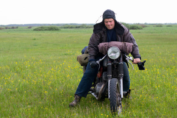 istock A post apocalyptic man on motorcycle in a meadow 967130930
