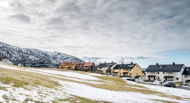 istock Colourful houses on the snowy hill 967139168