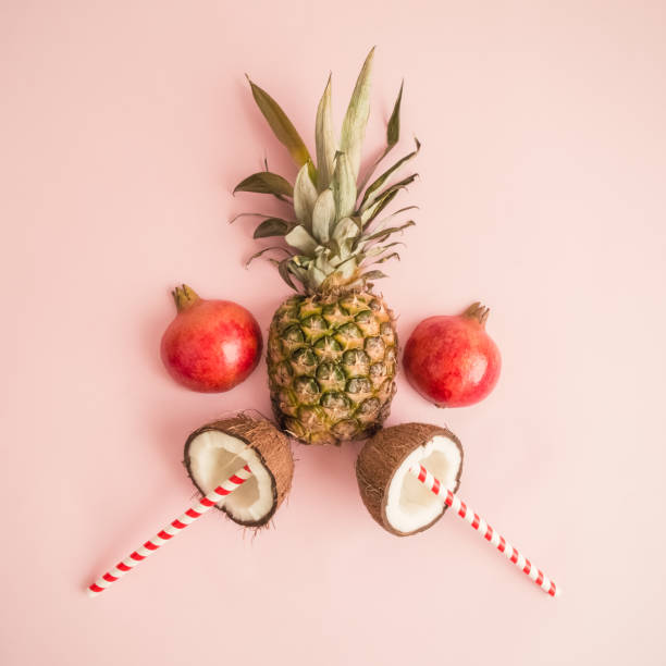 istock Flat lay tropical fruits rose background abstract. 967190418