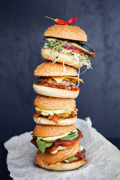 istock Extra big burger on the black background 967196474