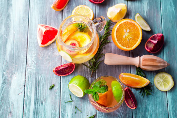 istock Homemade sparkling lemonade on a blue background 967215822