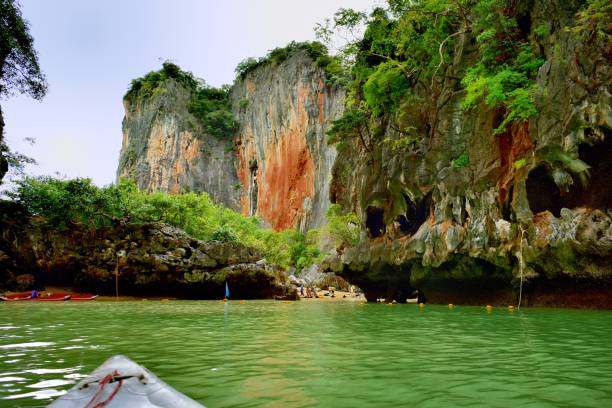 Tourists in canoes around Khao Phing Kan