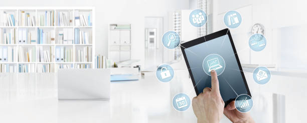 istock office business work concept, hand touch screen icons of digital tablet, web banner and copy space template 967239356