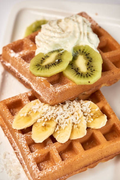 istock Belgian waffles with banana and kiwi. 967239694