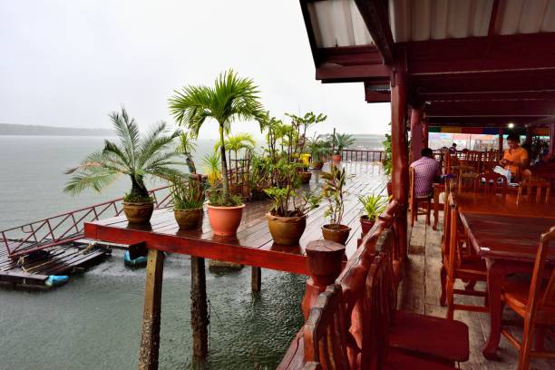 ristoranti presso il villaggio di pescatori di kho panyi - phuket province thailand tourist asia foto e immagini stock