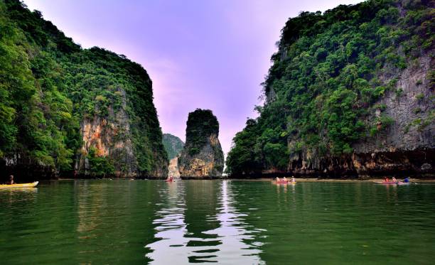 istock Tourists in canoes around Khao Phing Kan 967249342