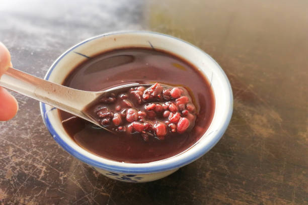 Red bean or azuki bean soup, popular dessert in Malaysia Delicioous red bean or azuki bean soup, popular dessert among Chinese in Malaysia adzuki bean photos stock pictures, royalty-free photos & images