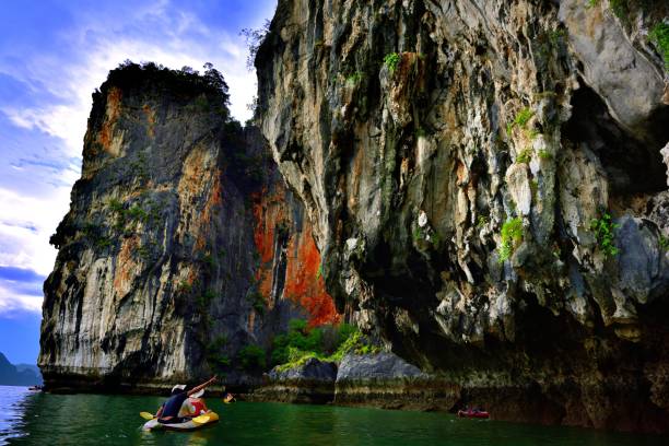 istock Tourists in canoes around Khao Phing Kan 967255920