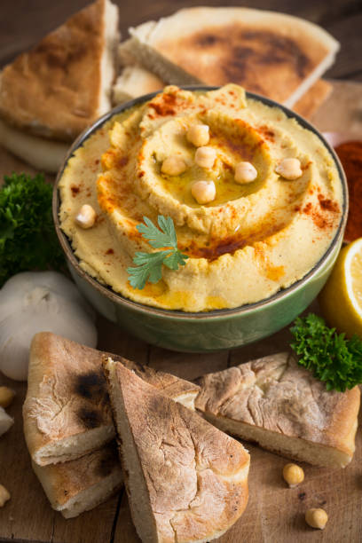 istock Homemade chickpea hummus with olive oil 967264540