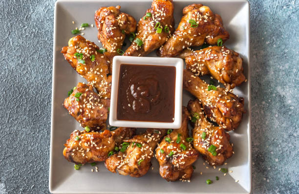 istock Chicken teriyaki wings with barbecue sauce 967266492