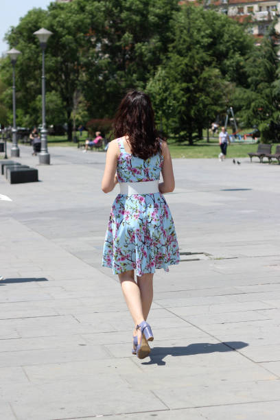 istock Young woman walking in the Park 967266948