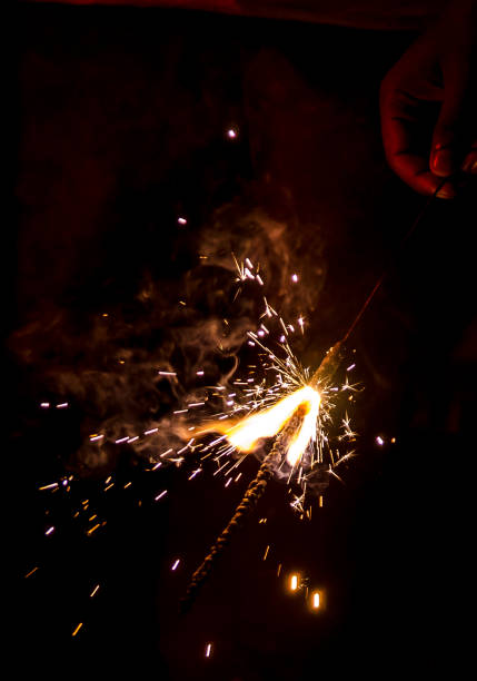 istock A firecracker sparkling and illuminating the dark night away 967267270