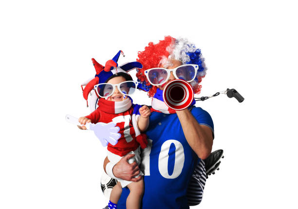 Football fans Football fans, father in a wig and the son vuvuzela stock pictures, royalty-free photos & images