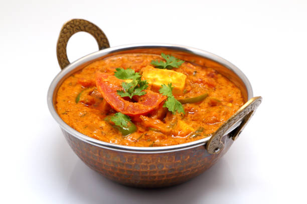 istock Indian Food or Indian Curry in a copper brass serving bowl. 967269746