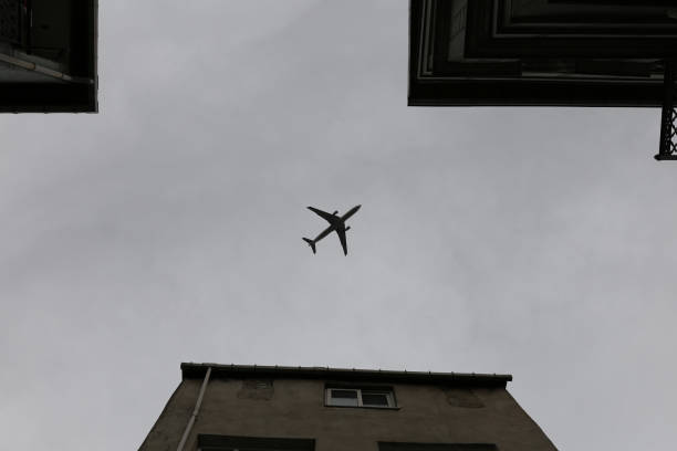 istock Airplane passing over Fener District in Istanbul, Turkey 967283500