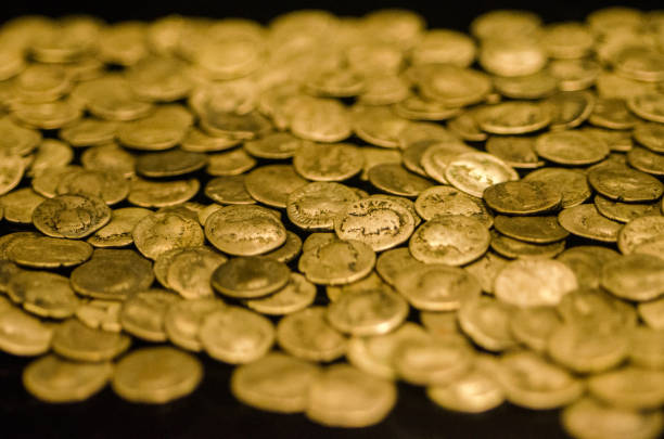istock Pile of antique gold coins 967287764