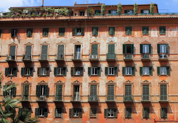 istock Facade of an ancient building in Rome. 967295244