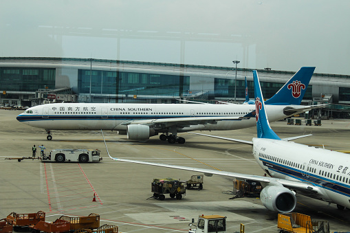 Wuhan, China - March 14, 2018: China Southern airplane parked at Wuhan airport