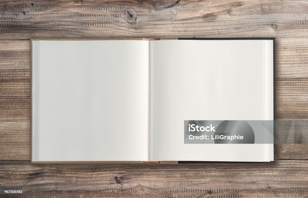 Open book wooden background Minimal flat lay Open book on rustic wooden background. Minimal flat lay Book Stock Photo