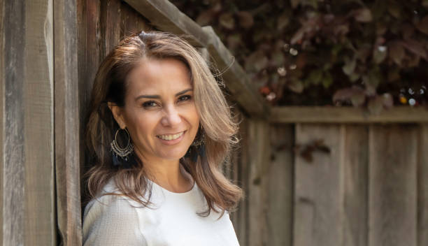 istock Smiling mature woman looking at the camera 967315352