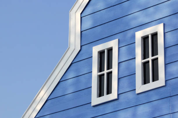 istock gable roof with windows on wooden house 967343224