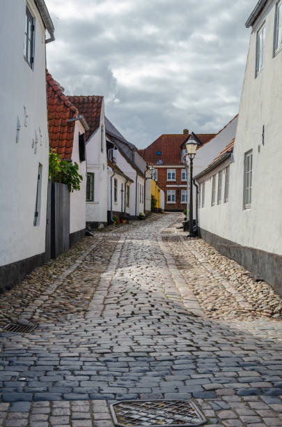 istock Narrow Street In Old Historical Town 967346176