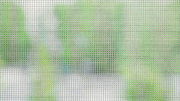 istock Mosquito net on the window. Protection against insects. Background. 967349802