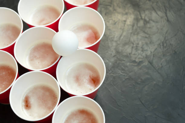 istock Beer pong. Popular game at parties. Place for your text. 967353572