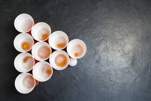 istock Beer pong. Popular game at parties. Place for your text. 967353594