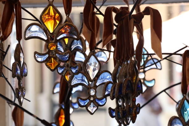 Fleur-de-lis in New Orleans Fleur-de-lis is a symbol of New Orleans. This beautiful piece made in glass is amazing! new orleans fleur de lis stock pictures, royalty-free photos & images