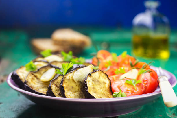 istock Aubergine, tomato, garlic salad 967365508