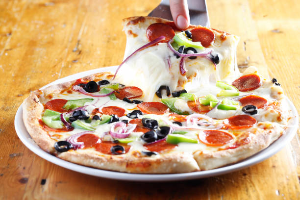 Pizza pull with salami, red onion, green peppers and black olives