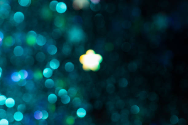 istock Colorful glitter abstract background with bokeh 967374396