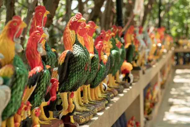 These statue chickens are symbol of believe in holy thing in Thailand.